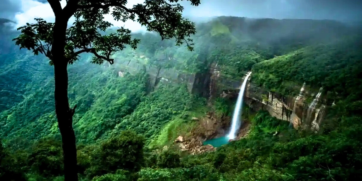 Nohkalikai waterfall cascading into turquoise pool in Meghalaya
